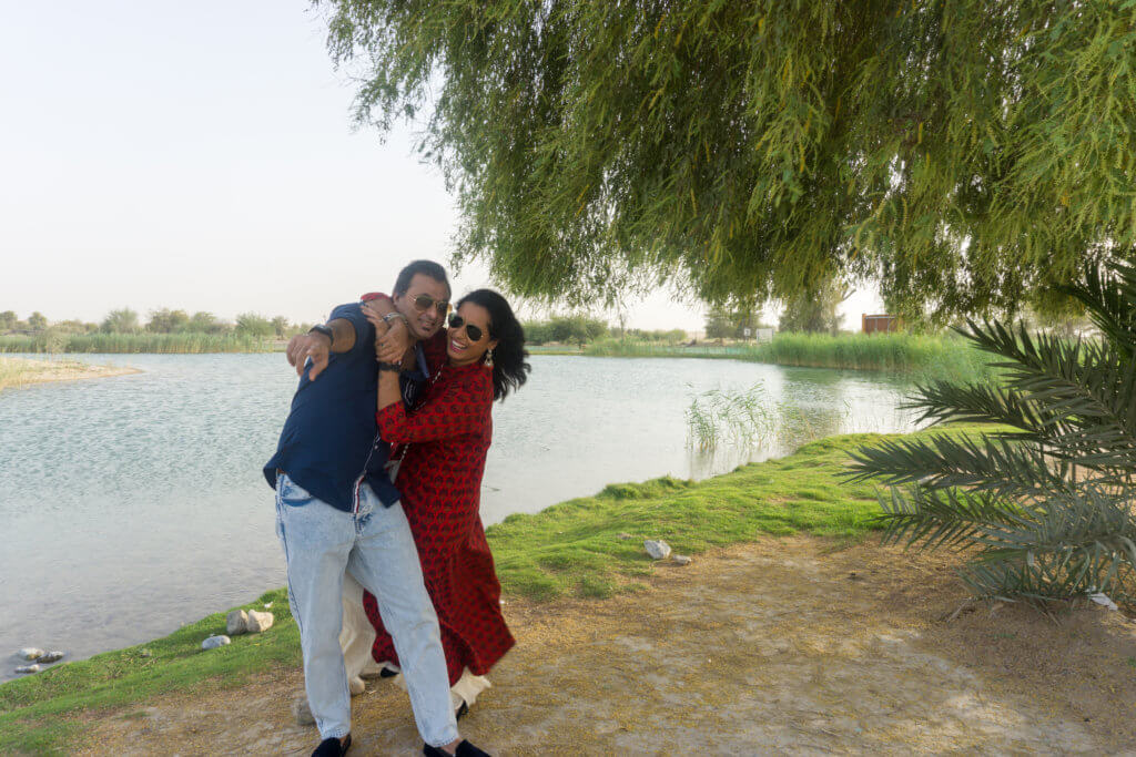 me and my husband at the al qudra lakes in dubai