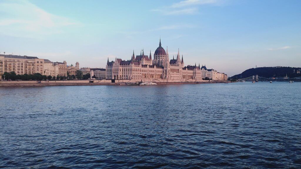Detonation - Budapest. cruising on the danube river with royal castle in the distance.