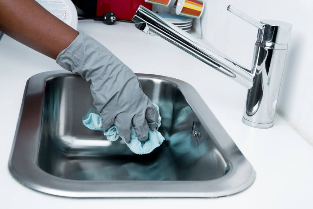 cleaning of wash basin at a workplace