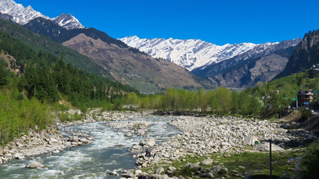 river flowing between mountains