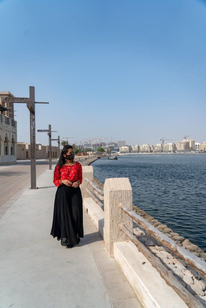 a girl overlooking the Dubai Creek