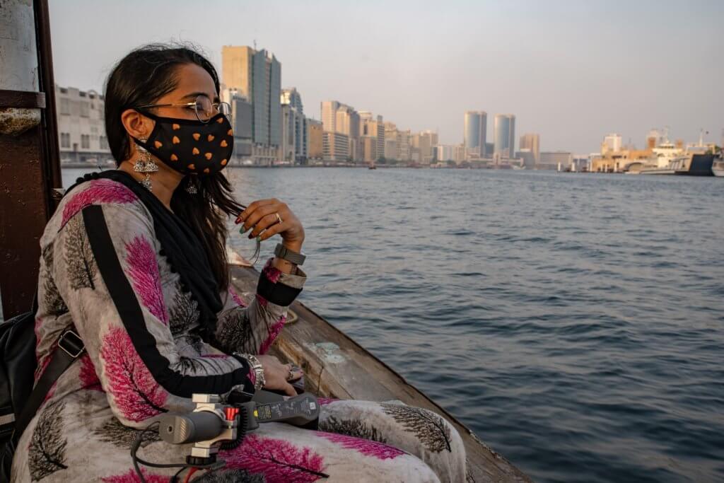 sitting in the traditional boat in Dubai crossing over the creek